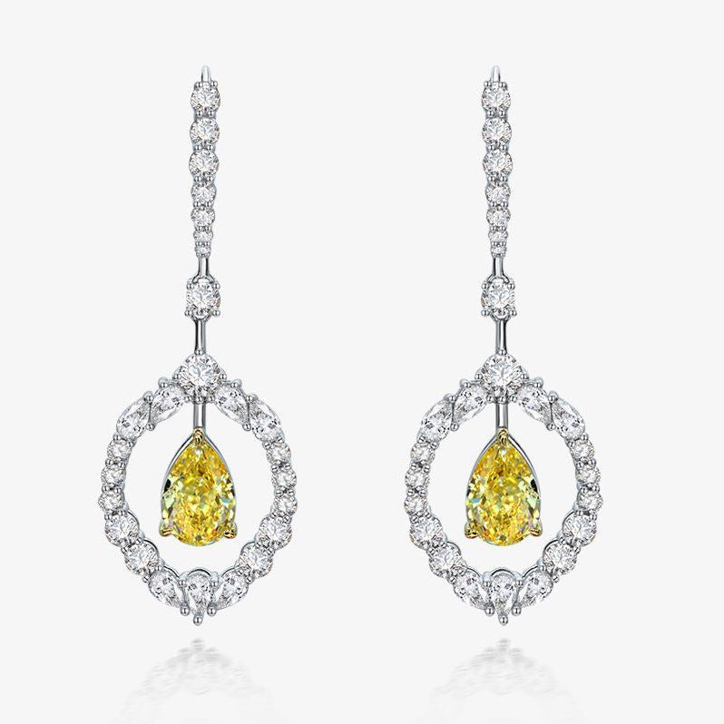Shipei Jewelry earrings with yellow gemstones on a white background