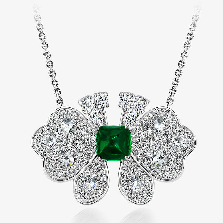 Silver necklace with a green gemstone pendant on a white background, featuring the brand 'SHIPEI JEWELRY'.