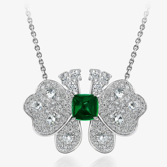 Silver necklace with a green gemstone pendant on a white background, featuring the brand 'SHIPEI JEWELRY'.