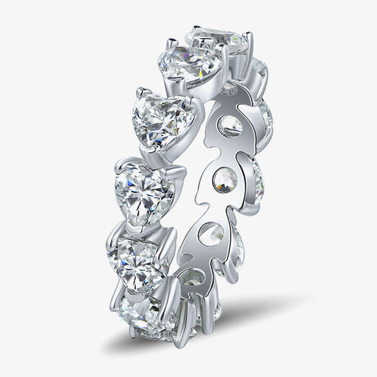 Silver ring with heart-shaped gemstones on a white background, featuring the Shipei Jewelry logo.