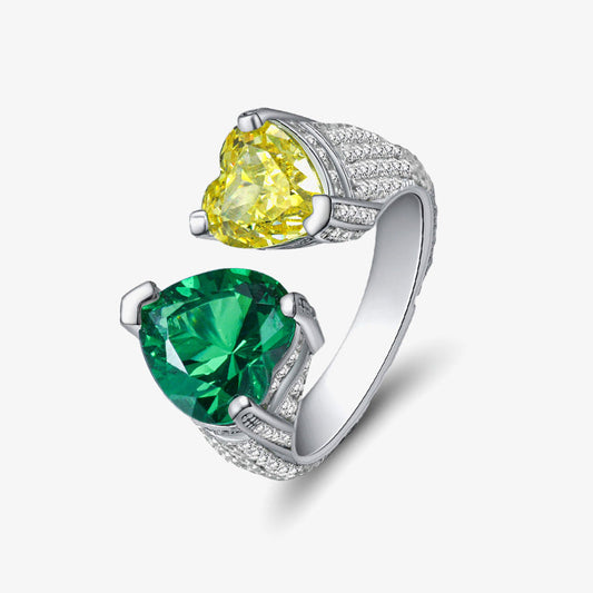 Two heart-shaped gemstone rings with 'SHIPEI JEWELRY' branding on a white background.