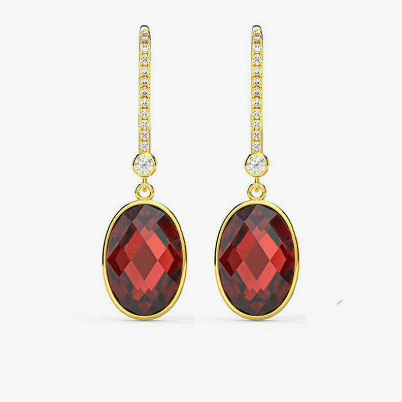 Gold earrings with red gemstones on a white background, featuring the Shipei Jewelry brand.
