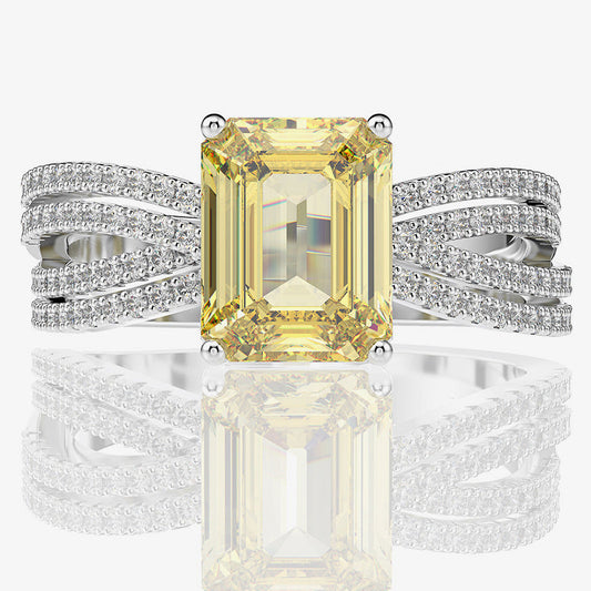 Ring with yellow gemstone and silver band on a white background, featuring Shipei Jewelry logo.