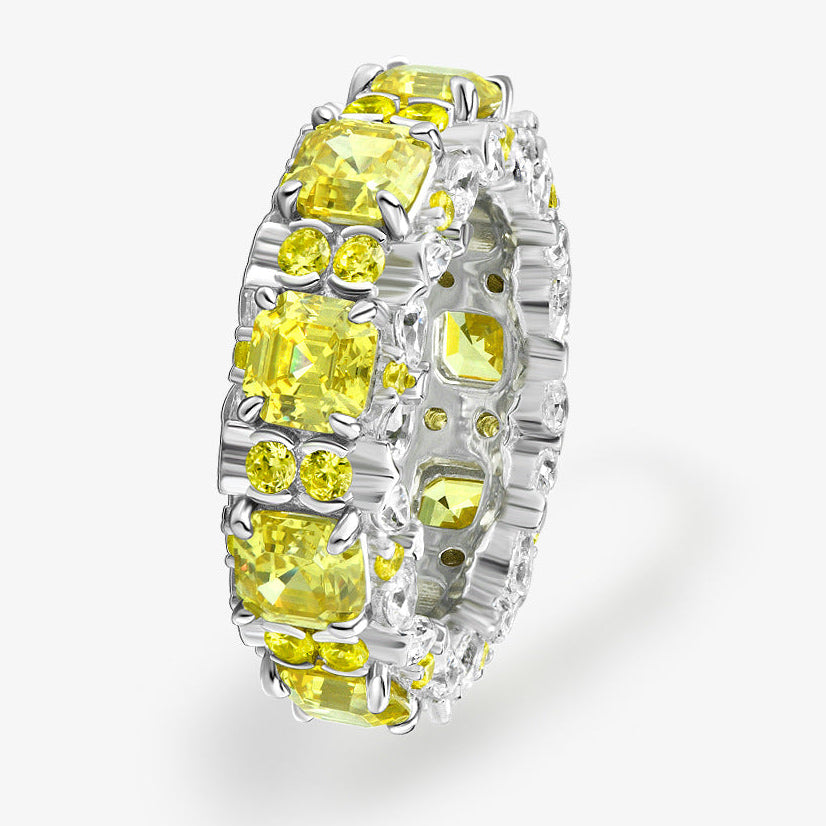 Ring with yellow gemstones on a white background, featuring the Shipei Jewelry logo.