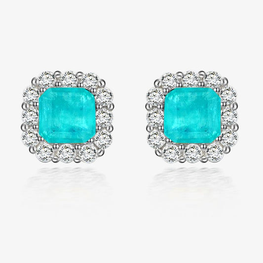 Turquoise gemstone earrings with silver surround on a white background, featuring the Shipei Jewelry logo.