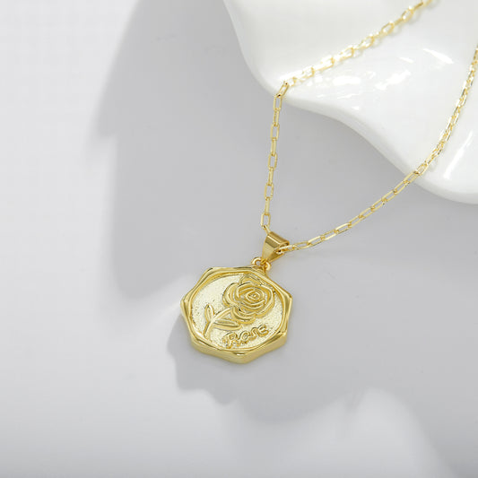 18K gold plated necklace rose on a base plate
