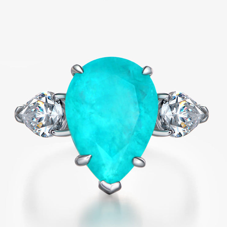 Paraiba Blue Pear Three-Stone Ring – Sterling Silver, 6 Carat